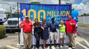Celebrating 100 million meals packed at a local packing event